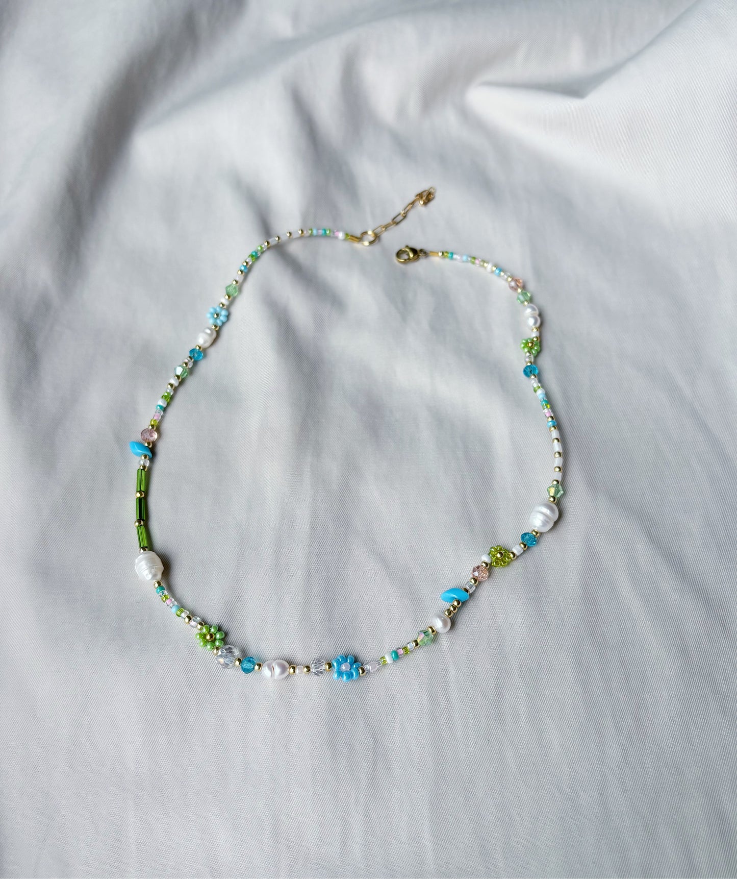 Beaded flower necklace in blue and green