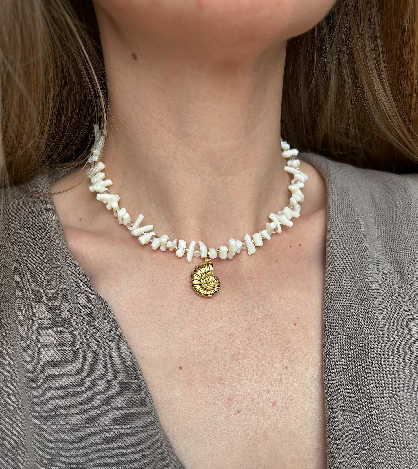 White coral beaded necklace with shell pendant