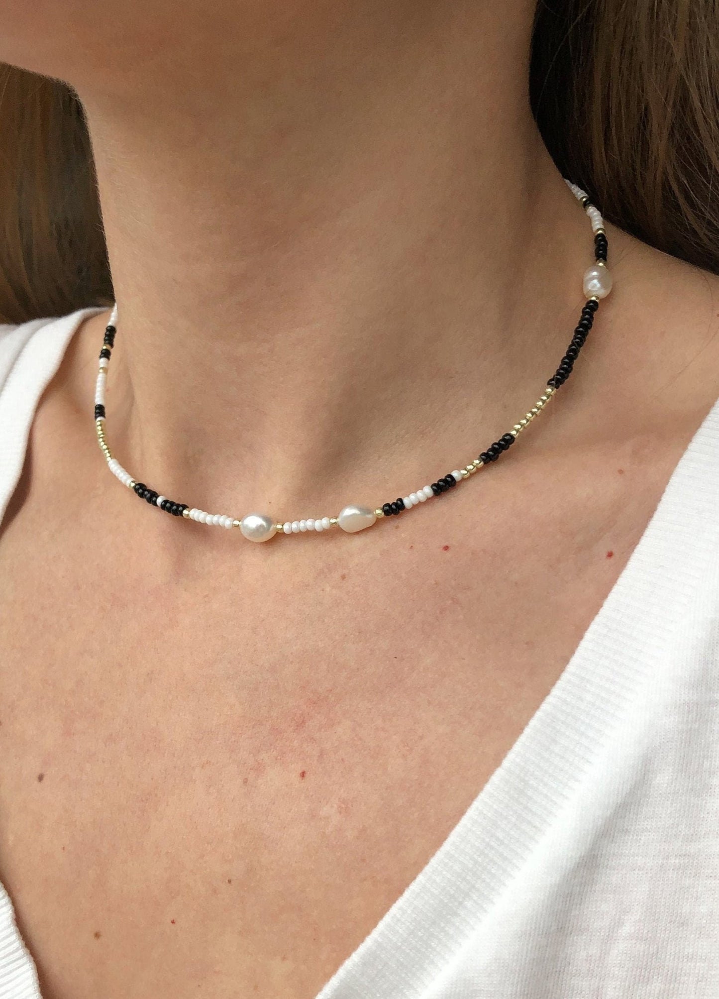 Black and white beaded necklace with freshwater pearls