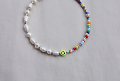 Smiley face pearl necklace with glass beads