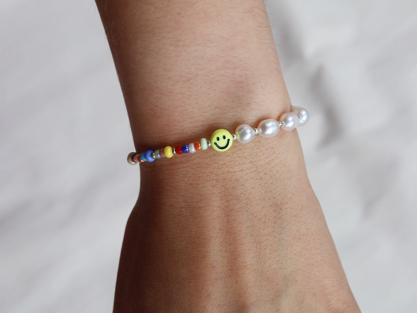 Smiley face beaded bracelet with pearls